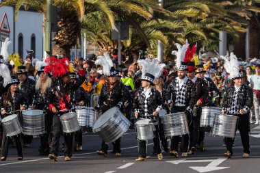 SANTA CRUZ DE TENERIFE, SPAIN - FEBRUARY 21, 2023: Coso parade - along the Avenida de Anaga, official end of Carnival. Again march carnival groups, floats, decorated cars and the Carnival Queens.