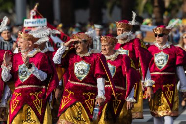 SANTA CRUZ DE TENERIFE, SPAIN - FEBRUARY 21, 2023: Coso parade - along the Avenida de Anaga, official end of Carnival. Again march carnival groups, floats, decorated cars and the Carnival Queens.