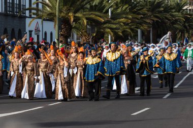 SANTA CRUZ DE TENERIFE, SPAIN - FEBRUARY 21, 2023: Coso parade - along the Avenida de Anaga, official end of Carnival. Again march carnival groups, floats, decorated cars and the Carnival Queens.