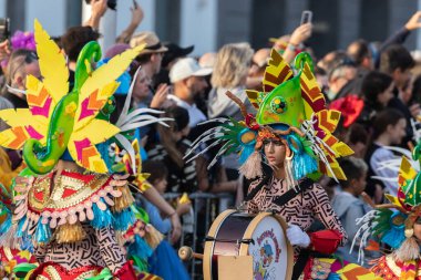 SANTA CRUZ DE TENERIFE, SPAIN - FEBRUARY 21, 2023: Coso parade - along the Avenida de Anaga, official end of Carnival. Again march carnival groups, floats, decorated cars and the Carnival Queens.