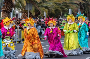 SANTA CRUZ DE TENERIFE, SPAIN - FEBRUARY 21, 2023: Coso parade - along the Avenida de Anaga, official end of Carnival. Again march carnival groups, floats, decorated cars and the Carnival Queens.