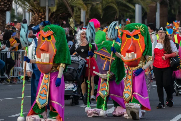 SANTA CRUZ DE TENERIFE, SPAIN - FEBRUARY 21, 2023: Coso parade - along the Avenida de Anaga, official end of Carnival. Again march carnival groups, floats, decorated cars and the Carnival Queens.