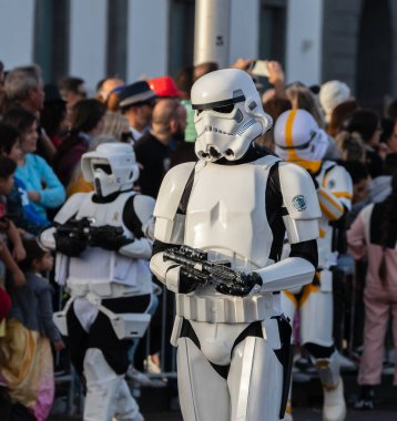 SANTA CRUZ DE TENERIFE, SPAIN - FEBRUARY 21, 2023: Coso parade - along the Avenida de Anaga, official end of Carnival. Again march carnival groups, floats, decorated cars and the Carnival Queens.