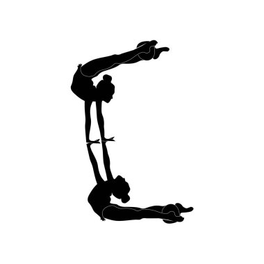 Ritmik jimnastik. İki kız top işaretli.