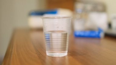 Sick woman use effervescent tablet medicine for flu disease treatment,self health care. 4k