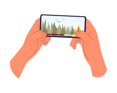 Cep telefonu ekranından video izliyorum. Podcast, haber, online video izleme, talk show, TV uygulaması, canlı yayın. Telefonu tutan eller.