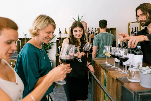 Women Participating Blind Wine Tasting Winery Checking Wine Color Glass fotografii de stoc fără drepturi de autor
