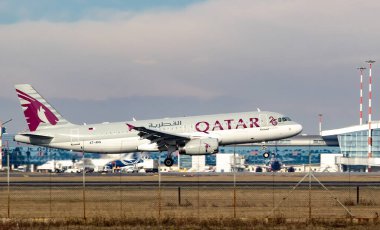 Bucharest, Romania - January 17, 2023:  Qatar Airways, A7-AHG, Airbus A320-232, aircraft lands at Henri Coanda Airport in Otopeni.