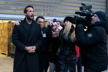 Bucharest, Romania - January 25, 2023: Tristan Tate and his brother leave the Directorate for Investigating Organized Crime and Terrorism DIICOT where their phones and laptops were searched
