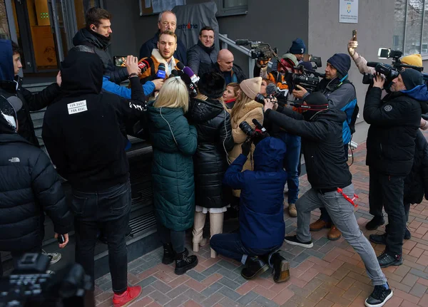 Bucharest, Romania - January 25, 2023: Eugen Vidineac (L) and Ioan Gliga (R) lawyers of Andrew and Tristan Tate brothers talk to reporters about the case in which they are being investigated.
