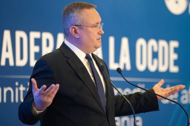 Bucharest, Romania - February 09, 2023: Romanian prime minister Nicolae Ciuca speaks at the the event Accession to the OECD  Opportunities for the business environment in Romania.