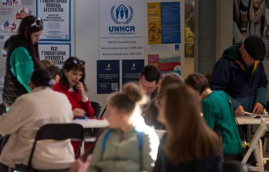 Bucharest, Romania. 13th Mar, 2023: Ukrainian refugees receive humanitarian assistance at the UNHCR integrated center for Ukrainian refugees. This image is for editorial use only.