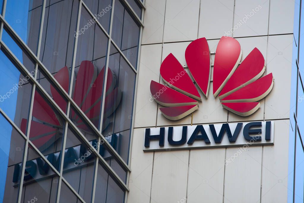 Bucharest, Romania - July 10, 2023: A logo of Huawei, Chinese telecommunications equipment company, is displayed on the top of a building, in Bucharest, Romania.