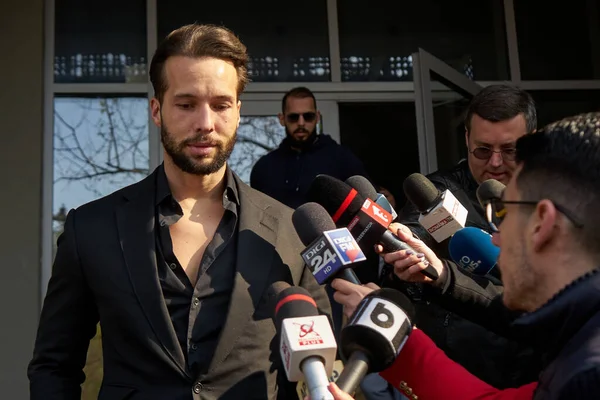 stock image Bucharest, Romania. 10th Apr, 2023: Tristan Tate (L) and his brother Andrew Tate (C) leave the Directorate for Investigating Organized Crime and Terrorism DIICOT