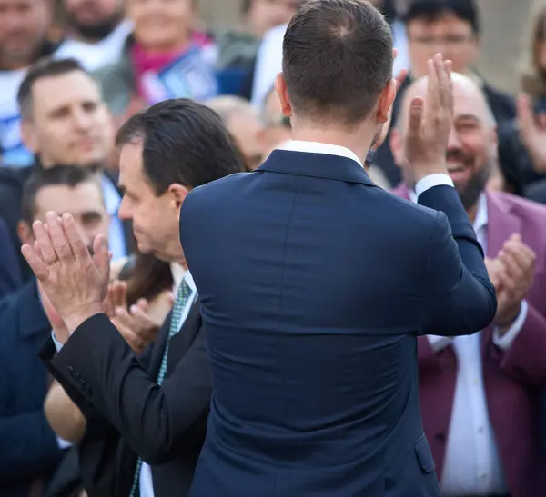 stock image Bucharest, Romania. 17th Mar, 2024: Ludovic Orban (L), president of Force of the Right (FD), and Catalin Drula (R), Save Romania Union President, applaud during a signature gathering event