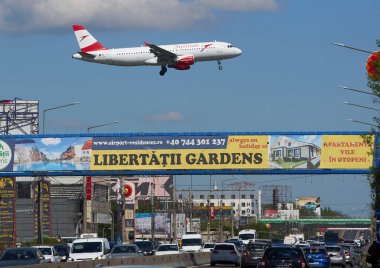 Otopeni, Romania. 8th Apr, 2024: Austrian Airlines flight Vienna to Bucharest, OS783, lands at Bucharest Henri Coanda International Airport (AIHCB), over the National Road no. 1 in Otopeni, 16.5 km north of Bucharest. Romania and Bulgaria partially clipart