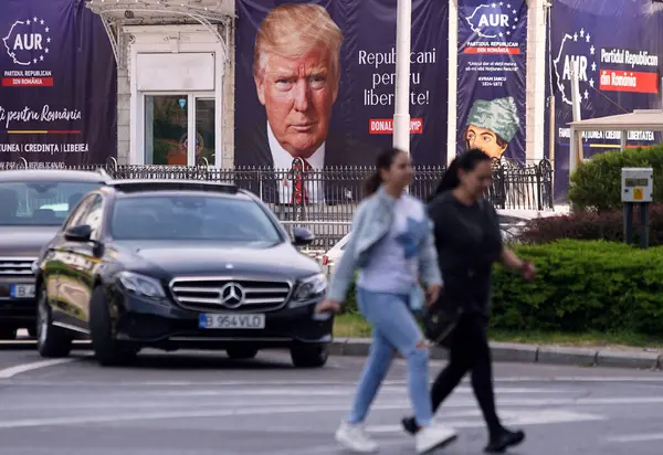 stock image Bucharest, Romania. 21st May, 2024: A picture of the former American president, Donald Trump, is on a large banner at the headquarters of the Romanian Republican Party.