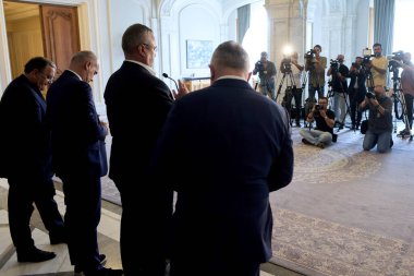 Bucharest, Romania. 1st July, 2024: Nicolae Ciuca (third-left), president of National Liberal Party (PNL), holds a press conference after the meeting of the National Political Bureau of the National Liberal Party. clipart