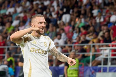 Bükreş, Romanya. 13 Ağustos 2024: Spartalı Lukas Haraslin, UEFA Şampiyonlar Ligi 'nde FCSB ile Bükreş' teki Steaua Stadyumu 'nda oynanan ve FCSB ile AC Sparta Praha arasında oynanan üçüncü tur ikinci tur futbol karşılaşmasında FCSB' ye gol attıktan sonra kutlama yaptı..