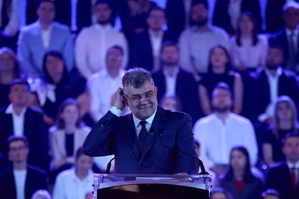 stock image Bucharest, Romania. 22th Aug, 2024: Marcel Ciolacu, PSD president and Romanian prime minister, delivers a speech announcing his candidacy for the Presidency of Romania, during the Congress of the Social Democratic Party (PSD), at ROMEXPO Exhibition C