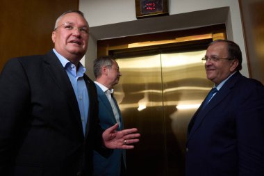 Bucharest, Romania. 29th Aug, 2024: Nicolae Ciuca (L), the president of the National Liberal Party (PNL), leaves followed by vice-presidents Dan Motreanu (C) and Gheorghe Flutur (R) after the meeting of the National Political Bureau of the Party. clipart