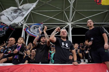 Bucharest, Romania. 1st Sep, 2024: FCSB fans greets the team after the victory against UTA at the end of the football match between FCSB and UTA Arad in the 8th round of Superliga, the first league of the Romanian 2024-2025 football championship, at  clipart