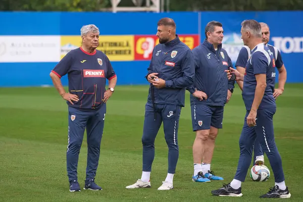 stock image Bucharest, Romania. 1st Sep, 2024: Mircea Lucescu (L), the new coach of the Romanian National Football Team, during the first official training of the national team.