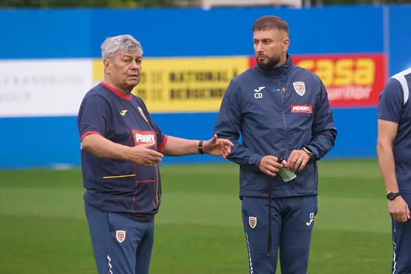 stock image Bucharest, Romania. 1st Sep, 2024: Mircea Lucescu (L), the new coach of the Romanian National Football Team, during the first official training of the national team.