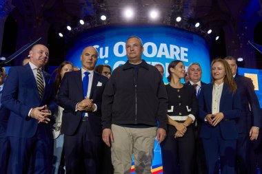 Bucharest, Romania. 15th Sep, 2024: Nicolae Ciuca (C), PNL president, during the National Council of National Liberal Party (PNL), held at the Palace of the Romanian Parliament. clipart