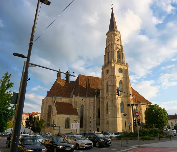 stock image Cluj-Napoca, Romania. 27th Apr, 2024: Romano-Catholic Church Saint Michael, 1349-1480, in Union Square, in the center of Cluj-Napoca.