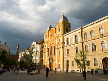 Cluj-Napoca, Romania. 26th Apr, 2024: The Piarist Church, built 1724, also known as the Jesuit Church and the University Church, on Universitatii street, in the old town of Cluj-Napoca. clipart