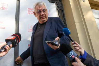 Bucharest, Romania. 15th Oct, 2024: Mihai Tudose, MEP and President of PSD National Council, speaks to the press upon arrival to the meeting of the Social Democratic Party (PSD) National Political Council, at the party's headquarters in Bucharest. clipart