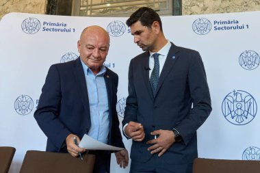 Bucharest, Romania. 4th Nov, 2024: Toader Mugur Mihai, the Prefect of the Municipality of Bucharest, during the swearing-in ceremony of George Tuta (R), the new Mayor of Sector 1 of Bucharest. clipart