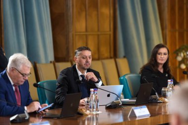 Bucharest, Romania. 23rd Dec, 2024: Daniel David (C), the Romanian Minister of Education attends the first cabinet meeting of the newly formed government, with Marcel Ciolacu serving as Prime Minister