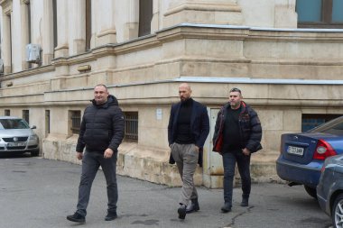 Bucharest, Romania. 30th Dec, 2024: Andrew Tate (C) leaves the Bucharest Court of Appeal. He appealed the measure of house arrest today. clipart