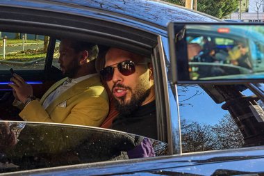 Bucharest, Romania. 9th Jan, 2025: Andrew Tate (L) and his brother Tristan Tate (R) leave the Bucharest Court, saying that with his party he will be the next Prime Minister of the United Kingdom. clipart