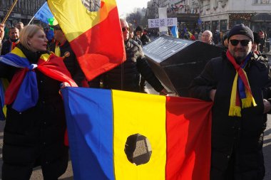 Bucharest, Romania. 13th Jan, 2025: Supporters of the far-right Alliance for the Union of Romanians (AUR) protest against the Constitutional Court's decision to cancel the presidential elections. clipart