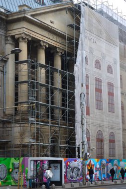 Bucharest, Romania - 31st Jan, 2025: The restoration work on the facades of the Palace of the University of Bucharest. The restoration and consolidation of the building started in March 2022 will last over 5 years. The Palace of the University of Buc clipart