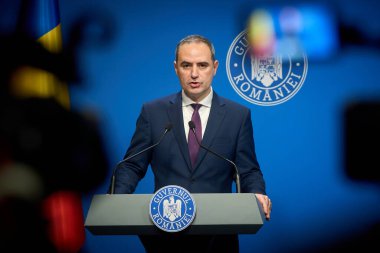 Bucharest, Romania. 1st Oct, 2025: Alexandru Nazare, Romanian Minister of Finance, holds press briefing after cabinet session on budget adjustment at Victoria Palace, the Romanian Government headquarters.