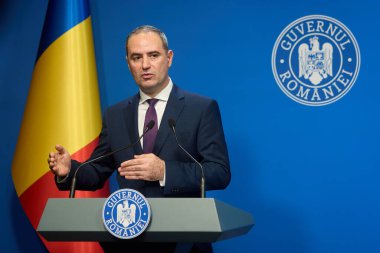 Bucharest, Romania. 1st Oct, 2025: Alexandru Nazare, Romanian Minister of Finance, holds press briefing after cabinet session on budget adjustment at Victoria Palace, the Romanian Government headquarters.
