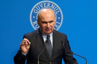 Bucharest, Romania. 3rd Oct, 2025: Ilie Bolojan, Prime Minister of Romania, holds a press conference marking 100 days since taking office at Victoria Palace, the headquarters of the Romanian Government.