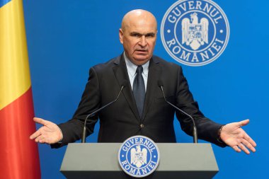 Bucharest, Romania. 3rd Oct, 2025: Ilie Bolojan, Prime Minister of Romania, holds a press conference marking 100 days since taking office at Victoria Palace, the headquarters of the Romanian Government.