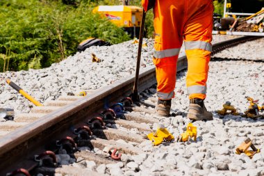 construction of a railway track, work on a railway in England clipart