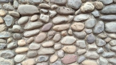 Taş bir duvarın dokusu. Eski kale taşı duvar dokusu arkaplanı