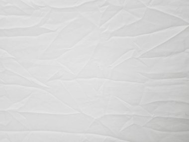 Grafik tasarımı veya duvar kağıdı için yumuşak beyaz kırışık kumaş arkaplanı.