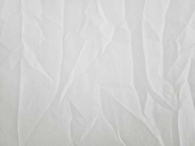 Grafik tasarımı veya duvar kağıdı için yumuşak beyaz kırışık kumaş arkaplanı.