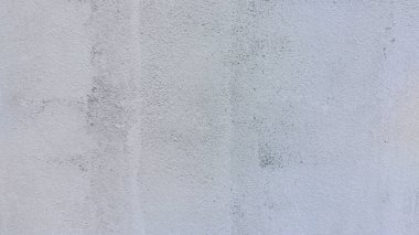 Çimento duvar arkaplanı. Grafik tasarımı ya da eski duvar kâğıdı için klasik tarzda boyanmamış. Eskimiş dokusu olan beton desen. Kırsal bölgelerde çatı katı tipi duvarcılık bulundu.
