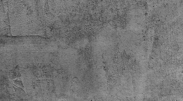 Grafik tasarımı veya duvar kâğıdı için klasik tarzda koyu çimento duvar arkaplanı. Beton zemin eski bir konsepte göre yaşlanmış..