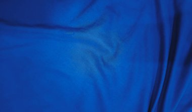 Grafik tasarımı ya da duvar kağıdı için koyu mavi kumaş. Şatafatlı kumaş desenli bulanık kumaş. Klasik tarzda pürüzsüz dalgalarla güzel soyut arkaplan.