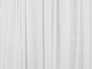 Grafik tasarımı veya duvar kağıdı için yumuşak beyaz perde arka planı. Tiyatro konseptinde klasik tarzda yumuşak dalgalarla lüks bir fon..